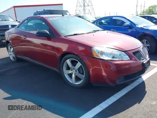 2008 Pontiac G6 GT with VIN 1G2ZH36N084305494, listed as a IAAI auction lot 42006516 with 154,577 mi miles. Bid and sale history available at carsss.com. Image 1.