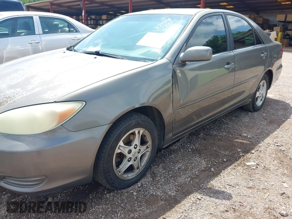 2004 Toyota Camry LE with VIN 4T1BE30K24U921028, listed as a IAAI auction lot 42187174 with 295,174 mi miles and . Bid and sale history available at DreamBid. Image 12.