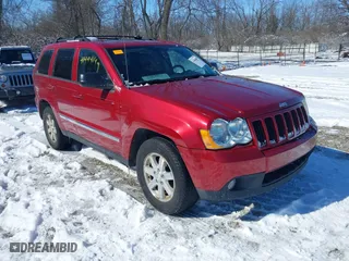 2010 Jeep Grand Cherokee Laredo with VIN 1J4RR4GT0AC135770, listed as a IAAI auction lot 41444149 with 226,746 mi miles. Bid and sale history available at carsss.com. Image 1.