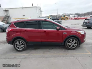 2015 Ford Escape Titanium with VIN 1FMCU0JX2FUA04643, listed as a IAAI auction lot 41019925 with 79,989 mi miles. Bid and sale history available at carsss.com. Image 13.