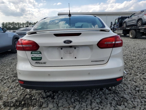 2016 Ford Focus Titanium with VIN 1FADP3J29GL223778, listed as a Copart auction lot 66171735 with Not provided miles and Salvage title. Bid and sale history available at DreamBid. Image 6.