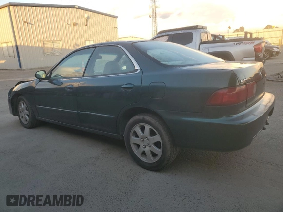 1999 Acura Integra with VIN JH4DB7665XS000928, listed as a Copart auction lot 80924344 with 198,981 mi miles and Salvage title. Bid and sale history available at DreamBid. Image 2.