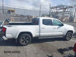 2018 Toyota Tacoma SR5 with VIN 3TMBZ5DN7JM016650, listed as a IAAI auction lot 41903835 with 105,123 mi miles and . Bid and sale history available at DreamBid. Image 14.