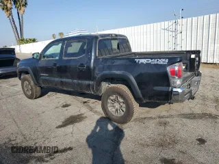 2022 Toyota Tacoma SR with VIN 3TMCZ5AN0NM475548, listed as a Copart auction lot 42057405 with 56,008 mi miles and Salvage title. Bid and sale history available at DreamBid. Image 2.