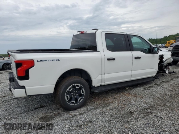 2023 Ford F-150 Lightning Pro z VIN 1FTVW1ELXPWG63466, wystawiony jako Copart lot #59163895 z przebiegiem Nie podano mil oraz Szkody całkowita. Historia ofert i sprzedaży dostępna na DreamBid. Obrazek 3.