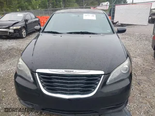 2014 Chrysler 200 Touring with VIN 1C3CCBBGXEN179723, listed as a IAAI auction lot 41981280 with 123,322 mi miles. Bid and sale history available at carsss.com. Image 6.
