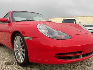 1999 Porsche 911 z VIN WP0AA2991XS620689, wystawiony jako Copart lot #59999925 z przebiegiem 152 508 mil mil oraz Czysty tytuł • Clean title. Historia ofert i sprzedaży dostępna na DreamBid. Obrazek 1.