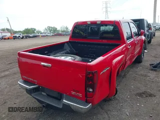2012 GMC Canyon with VIN 1GTH5PFE3C8152571, listed as a IAAI auction lot 42157980 with 144,778 mi miles and . Bid and sale history available at DreamBid. Image 4.