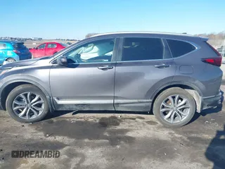 2021 Honda CR-V Touring with VIN 2HKRW2H9XMH681992, listed as a IAAI auction lot 41674120 with 43,000 mi miles. Bid and sale history available at carsss.com. Image 14.