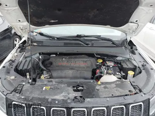 2018 Jeep Compass Altitude with VIN 3C4NJDBB3JT307076, listed as a IAAI auction lot 41387169 with 75,106 mi miles and . Bid and sale history available at carsss.com. Image 10.