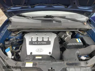 2006 Hyundai Tucson GLS with VIN KM8JN72D36U409525, listed as a IAAI auction lot 42082119 with 142,163 mi miles. Bid and sale history available at carsss.com. Image 10.