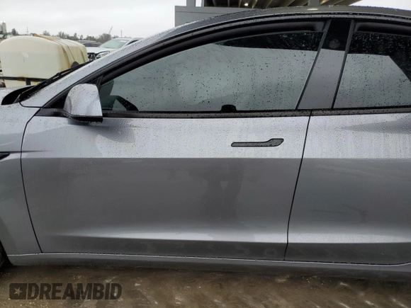 2025 Tesla Model 3 Long Range with VIN 5YJ3E1EA9SF918209, listed as a Copart auction lot 41908235 with Not provided miles and Salvage title. Bid and sale history available at DreamBid. Image 7.