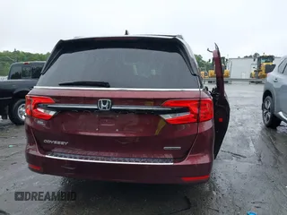 2021 Honda Odyssey Touring with VIN 5FNRL6H88MB006938, listed as a IAAI auction lot 42367022 with 63,280 mi miles and . Bid and sale history available at DreamBid. Image 15.