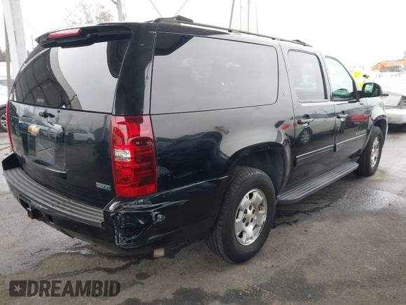 2011 Chevrolet Suburban LT with VIN 1GNSCJE01BR327933, listed as a IAAI auction lot 41813011 with 279,627 mi miles. Bid and sale history available at carsss.com. Image 4.