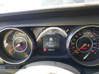 2022 Jeep Wrangler Unlimited Sport with VIN 1C4HJXDG5NW113205, listed as a IAAI auction lot 41836171 with 30,446 mi miles and . Bid and sale history available at DreamBid. Image 7.