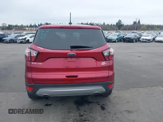 2018 Ford Escape SE z VIN 1FMCU9GD8JUB14803, wystawiony jako IAAI lot #41842056 z przebiegiem 50 712 mil mil oraz . Historia ofert i sprzedaży dostępna na DreamBid. Obrazek 17.