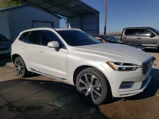 2018 Volvo XC60 Inscription with VIN LYVA22RLXJB097025, listed as a Copart auction lot 72199004 with 74,859 mi miles and Salvage Title. Bid and sale history available at DreamBid. Image 4.