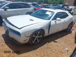 2014 Dodge Challenger R/T Plus z VIN 2C3CDYBT9EH293136, wystawiony jako IAAI lot #42264180 z przebiegiem 71 696 mil mil oraz . Historia ofert i sprzedaży dostępna na DreamBid. Obrazek 17.