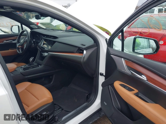 2023 Cadillac XT5 AWD Premium Luxury with VIN 1GYKNDR43PZ102819, listed as a IAAI auction lot 42007060 with 16,606 mi miles and . Bid and sale history available at DreamBid. Image 5.