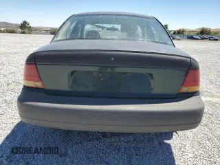 1996 Saturn SL with VIN 1G8ZG5289TZ221271, listed as a Copart auction lot 65957104 with 315,496 mi miles and Salvage Title. Bid and sale history available at carsss.com. Image 6.