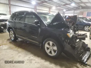 2011 Jeep Compass with VIN 1J4NT1FB8BD192253, listed as a Copart auction lot 87692135 with 0 mi miles and Salvage Title. Bid and sale history available at carsss.com. Image 4.