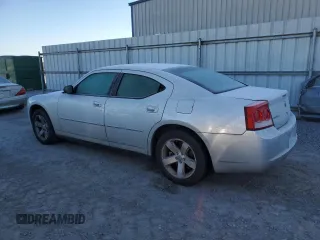 2009 Dodge Charger Police with VIN 2B3KA43TX9H587594, listed as a Copart auction lot 86266084 with 215,829 mi miles and Salvage Title. Bid and sale history available at DreamBid. Image 2.