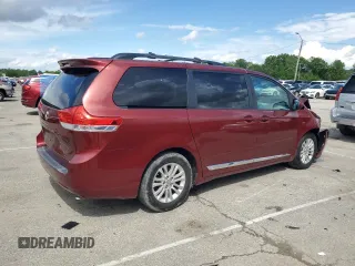 2012 Toyota Sienna XLE AAS with VIN 5TDYK3DC1CS233762, listed as a Copart auction lot 59224495 with 116,155 mi miles and Salvage title. Bid and sale history available at DreamBid. Image 3.