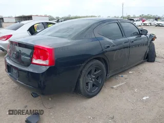 2009 Dodge Charger Police with VIN 2B3KA43T09H571873, listed as a IAAI auction lot 41842926 with 137,004 mi miles and . Bid and sale history available at carsss.com. Image 4.