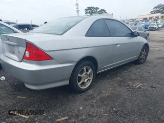 2005 Honda Civic Cpe LX with VIN 1HGEM22555L068087, listed as a IAAI auction lot 41553322 with 205,902 mi miles. Bid and sale history available at carsss.com. Image 4.
