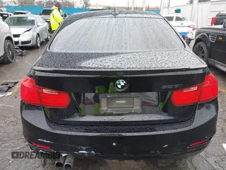 2015 BMW 3 Series 328i with VIN WBA3A5C59FF606236, listed as a IAAI auction lot 41690502 with 115,085 mi miles. Bid and sale history available at carsss.com. Image 16.