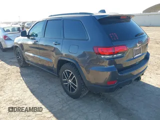 2018 Jeep Grand Cherokee Trailhawk with VIN 1C4RJFLT9JC244212, listed as a IAAI auction lot 41443469 with 77,953 mi miles and . Bid and sale history available at DreamBid. Image 3.