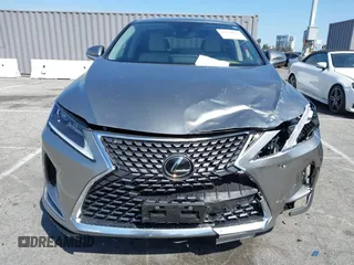2022 Lexus RX with VIN 2T2AZMAAXNC228573, listed as a IAAI auction lot 41976051 with 22,784 mi miles. Bid and sale history available at carsss.com. Image 12.