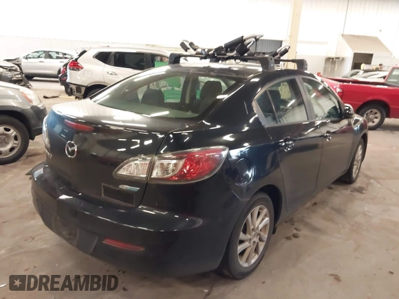 2012 Mazda Mazda3 i Touring with VIN JM1BL1V88C1540974, listed as a IAAI auction lot 41809430 with 121,334 mi miles. Bid and sale history available at carsss.com. Image 4.