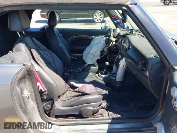 2005 MINI Convertible S with VIN WMWRH33545TF85051, listed as a IAAI auction lot 41843147 with 109,656 mi miles and . Bid and sale history available at DreamBid. Image 5.