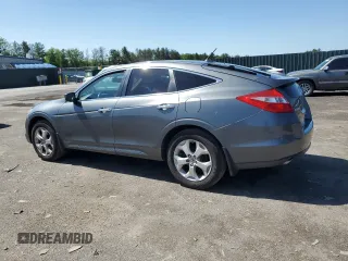 2012 Honda Crosstour EX-L z VIN 5J6TF2H53CL009635, wystawiony jako Copart lot #56073575 z przebiegiem 193 434 mil mil oraz Szkody całkowita. Historia ofert i sprzedaży dostępna na DreamBid. Obrazek 2.