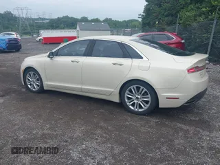 2014 Lincoln MKZ Hybrid with VIN 3LN6L2LU8ER813195, listed as a IAAI auction lot 42578644 with 153,893 mi miles and . Bid and sale history available at DreamBid. Image 3.