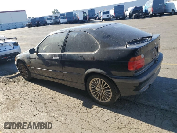 1997 BMW 3 Series 318tiA with VIN WBACG8326VAU38752, listed as a Copart auction lot 79974764 with 169,444 mi miles and Clean Title. Bid and sale history available at carsss.com. Image 2.