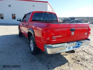 2005 Dodge Dakota SLT with VIN 1D7HE48N65S320064, listed as a IAAI auction lot 41276075 with 183,949 mi miles. Bid and sale history available at carsss.com. Image 3.