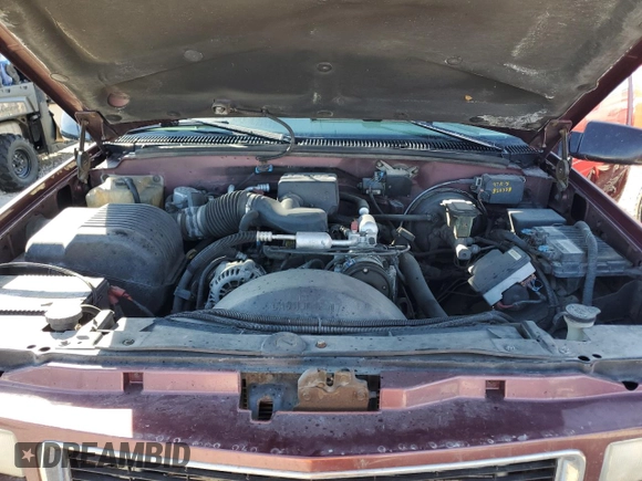 1997 GMC Suburban z VIN 1GKFK16R0VJ739603, wystawiony jako Copart lot #48430045 z przebiegiem 195 017 mil mil oraz Szkoda całkowita • Salvage title. Historia ofert i sprzedaży dostępna na DreamBid. Obrazek 11.