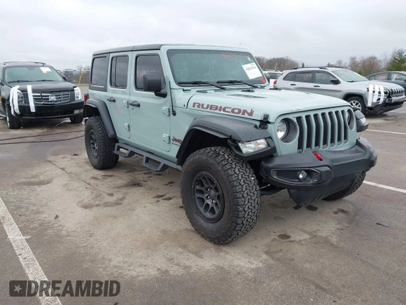 2023 Jeep Wrangler Rubicon with VIN 1C4JJXFG7PW654564, listed as a IAAI auction lot 41833534 with 22,277 mi miles and . Bid and sale history available at DreamBid. Image 1.