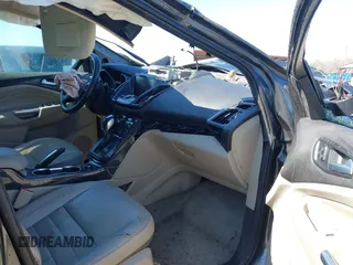 2015 Ford Escape Titanium with VIN 1FMCU0J90FUC10514, listed as a IAAI auction lot 41785756 with 222,434 mi miles and . Bid and sale history available at DreamBid. Image 5.