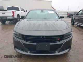 2023 Dodge Charger SXT with VIN 2C3CDXBG8PH566020, listed as a IAAI auction lot 41433879 with 22,187 mi miles and . Bid and sale history available at DreamBid. Image 6.