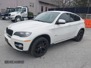 2012 BMW X6 50i z VIN 5UXFG8C53CL590479, wystawiony jako IAAI lot #42021810 z przebiegiem 92 420 mil mil oraz . Historia ofert i sprzedaży dostępna na DreamBid. Obrazek 2.