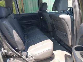 2007 Honda Pilot EX-L z VIN 5FNYF18527B005414, wystawiony jako IAAI lot #42445482 z przebiegiem 210 306 mil mil oraz . Historia ofert i sprzedaży dostępna na DreamBid. Obrazek 8.