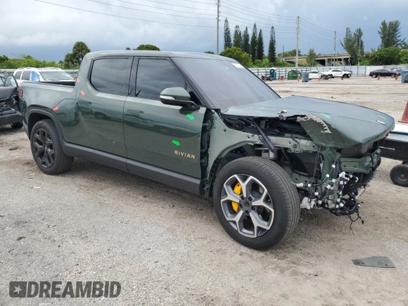 2023 Rivian R1T Adventure z VIN 7FCTGAAA8PN001040, wystawiony jako Copart lot #71517874 z przebiegiem 19 789 mil mil oraz Szkoda całkowita • Salvage title. Historia ofert i sprzedaży dostępna na DreamBid. Obrazek 4.