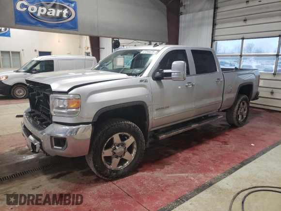 2015 GMC Sierra 2500HD SLT with VIN 1GT12ZE8XFF118001, listed as a Copart auction lot 47244475 with 119,962 mi miles and Salvage title. Bid and sale history available at DreamBid. Image 1.