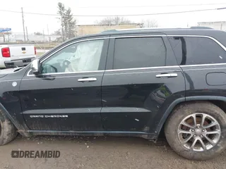 2014 Jeep Grand Cherokee Limited with VIN 1C4RJFBG2EC279944, listed as a IAAI auction lot 41591623 with 150,588 mi miles and . Bid and sale history available at DreamBid. Image 14.