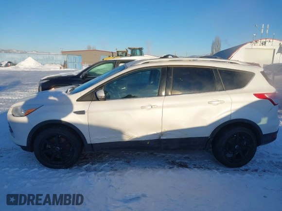 2016 Ford Escape Titanium with VIN 1FMCU9J94GUC81270, listed as a IAAI auction lot 41502724 with 128,161 mi miles. Bid and sale history available at carsss.com. Image 14.