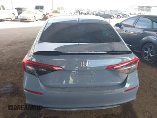 2022 Honda Civic Si with VIN 2HGFE1E58NH473302, listed as a IAAI auction lot 41473435 with 34,685 mi miles and . Bid and sale history available at DreamBid. Image 16.
