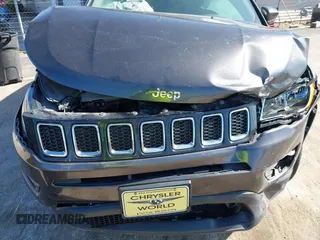 2018 Jeep Compass Altitude with VIN 3C4NJDBB6JT239565, listed as a IAAI auction lot 42219401 with 85,013 mi miles and . Bid and sale history available at DreamBid. Image 6.